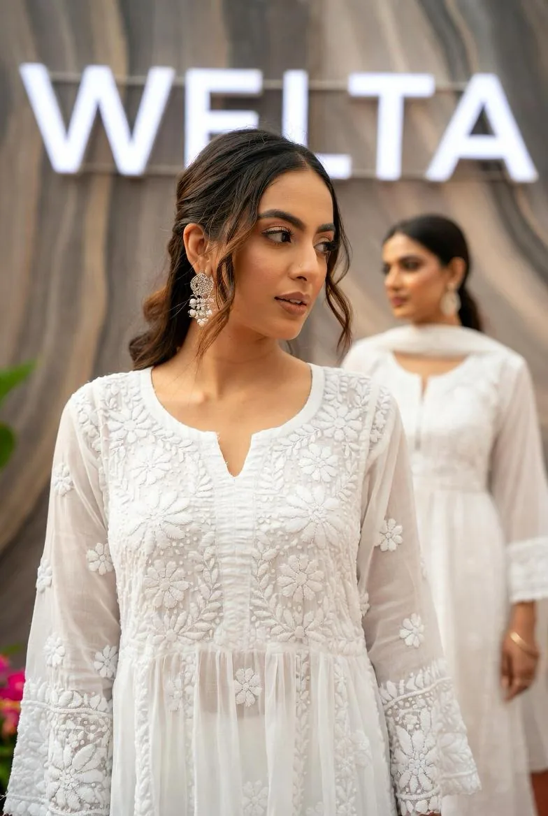 Model wearing a hand-embroidered white Lucknowi chikankari kurta at the WELTA studio